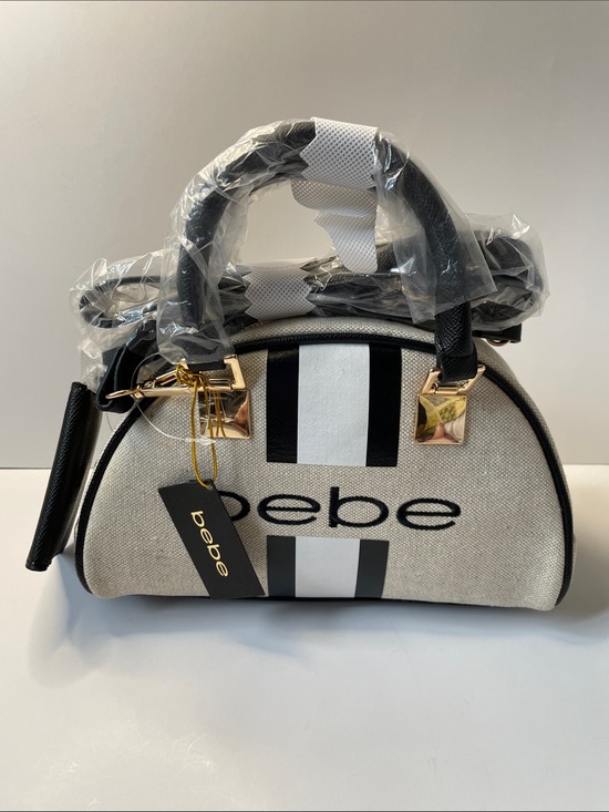 bebe Handbags - NWT bebe Cream Canvas Satchel with Black Stripes